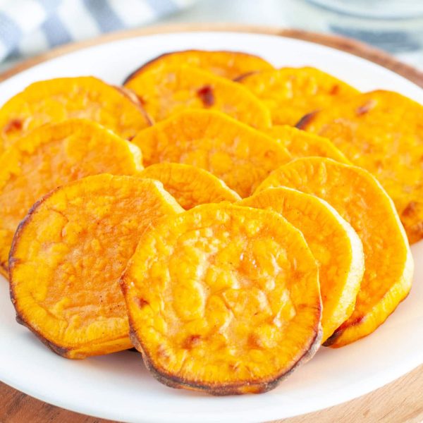 Roasted sweet potato slices on plate