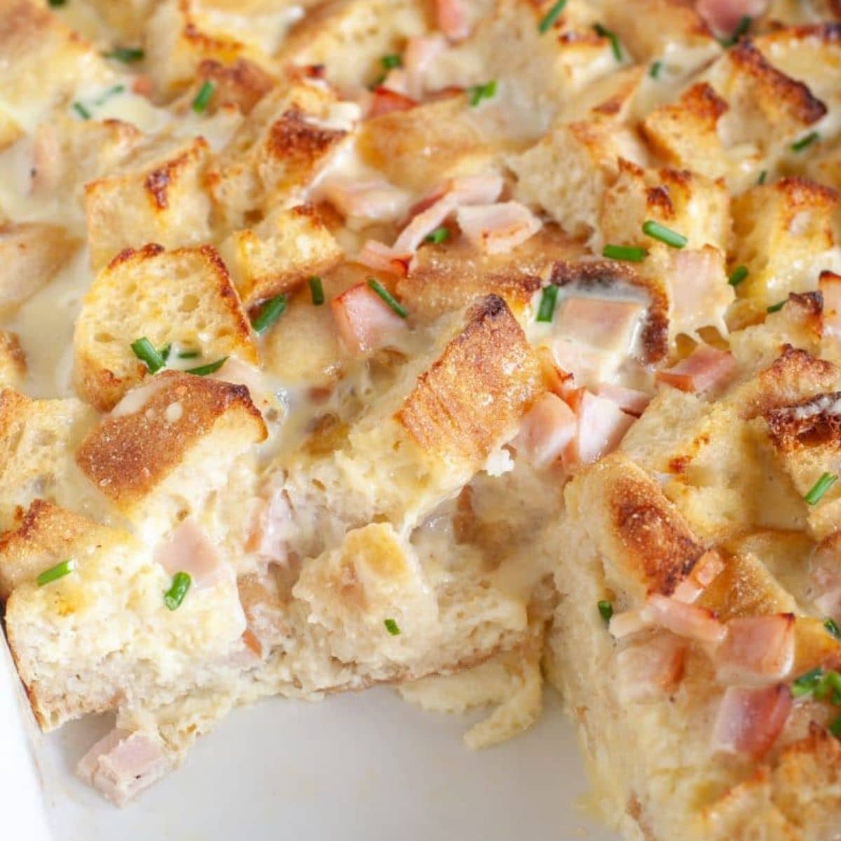 Eggs Benedict casserole in a baking dish.
