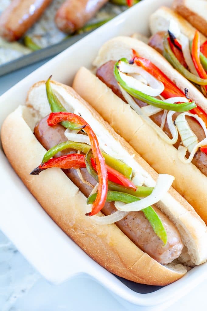 Sausage in roll with peppers and onions