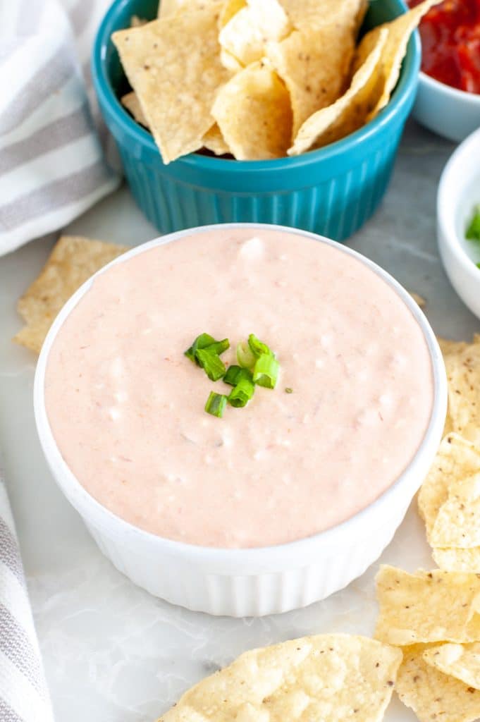 Dip in white bowl with tortilla chips