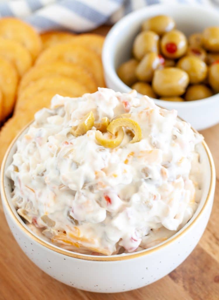 Bowl with dip and small bowl with olives 