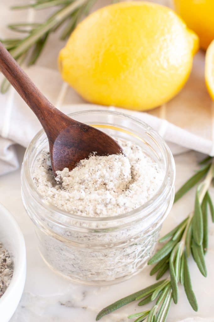 Salt in a bowl with wooden spoon