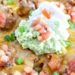 Nachos with avocado and sour cream.