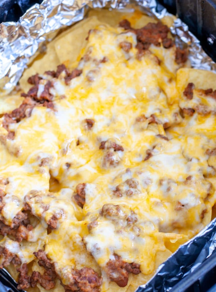 Beef nachos in air fryer basket. 