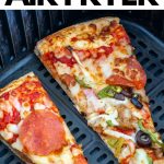 Pizza slices in air fryer basket.