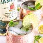 2 copper mugs with cocktails in them.