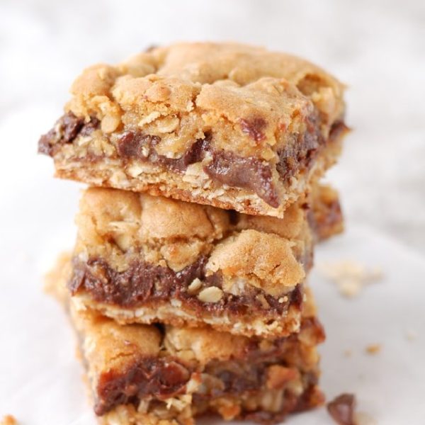 Stack of oatmeal bars on table.