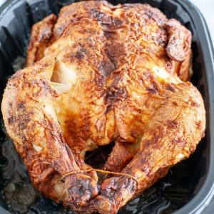 Chicken in a black container.