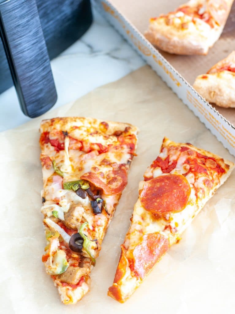 Pizza slices on table. 