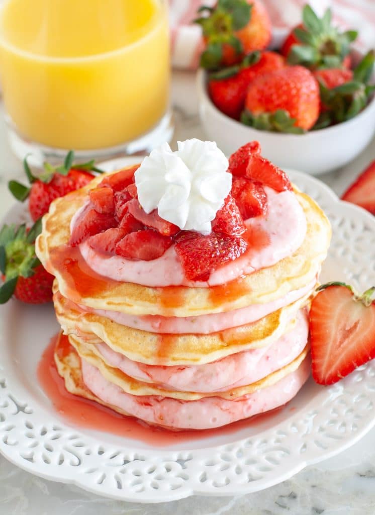 Stack of pancakes with strawberries. 