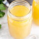 Jar of rotisserie chicken stock.