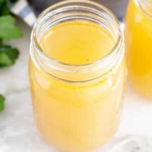 Jar of rotisserie chicken stock.