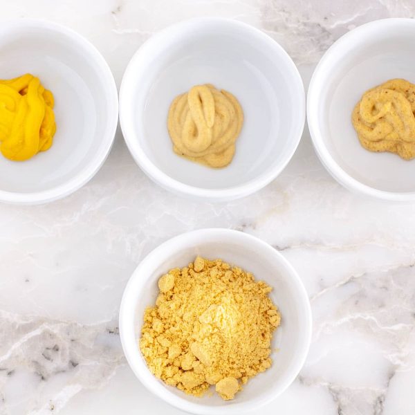 Bowls with different mustards.