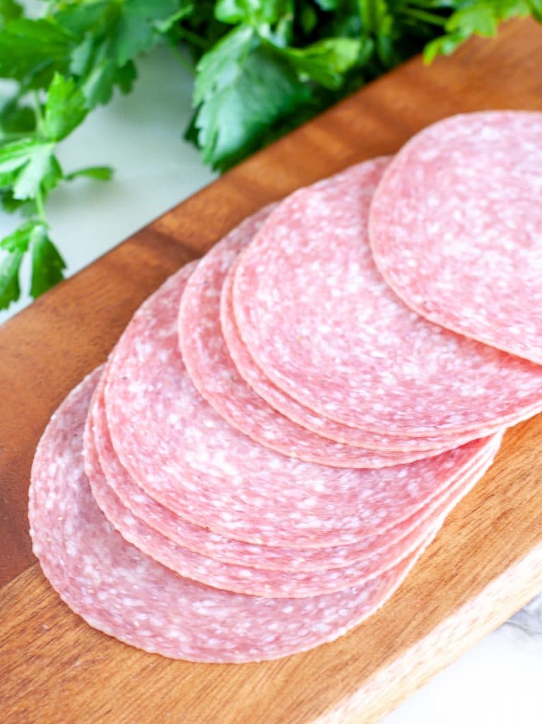 Cutting board with salami. 