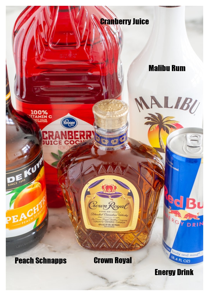 Bottle of whisky, schnapps, rum, energy drink and cranberry juice.