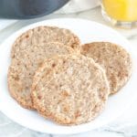 Plate with cooked breakfast sausage patties.