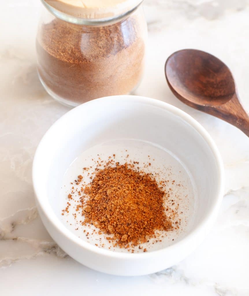 Jar and bowl of nutmeg. 