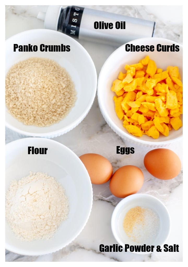 Bowl of cheese curds, panko, flour, eggs and garlic powder. 