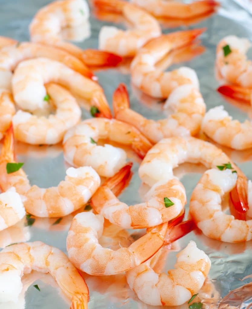 Cooked shrimp on foil. 