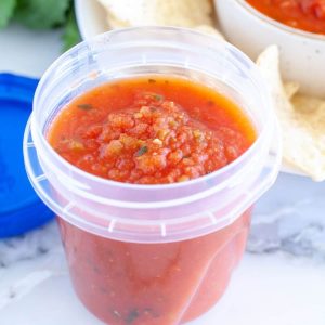 Salsa in a container.