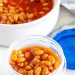 Beans in a plastic container.
