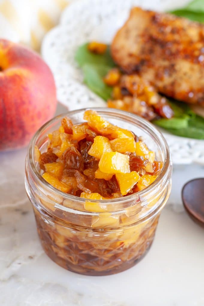 Jar with peach chutney.