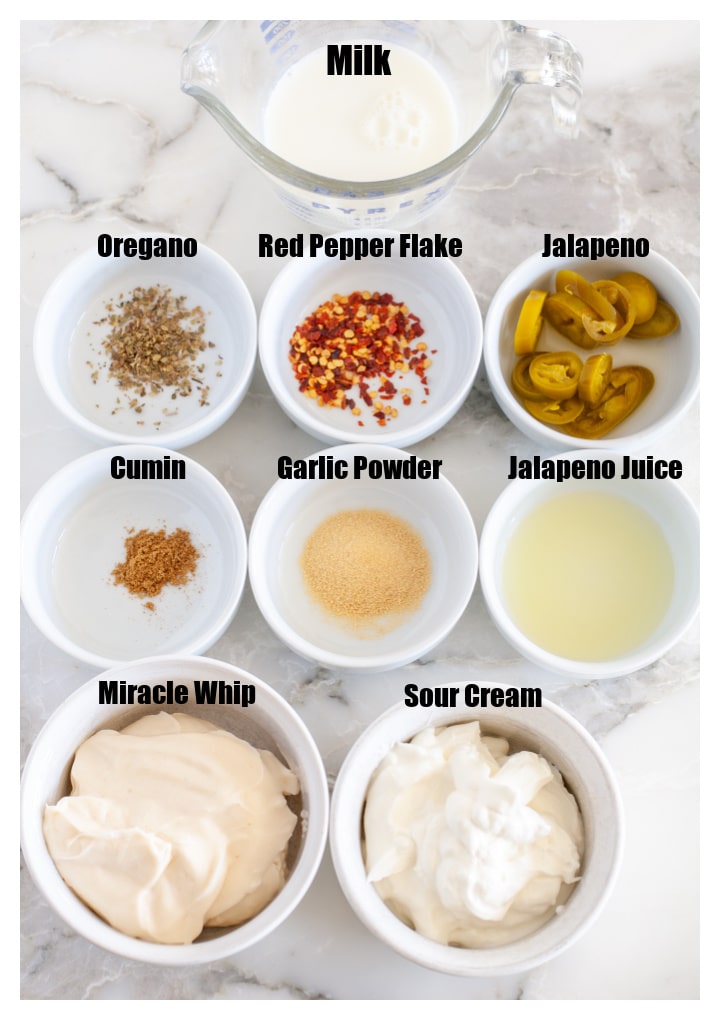 Bowls of spices, miracle whip and sour cream.