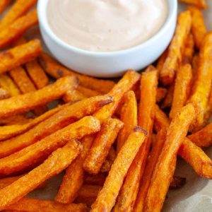 Cooked fries on a plate.