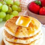 Pancakes stacked on a plate.