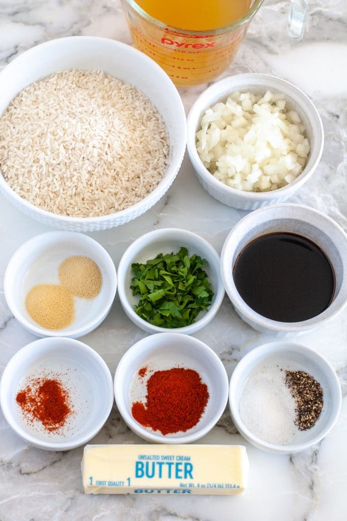 Bowls with seasonings and rice. 