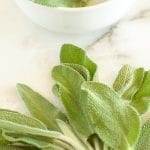 Fresh sage on table and in bowl.
