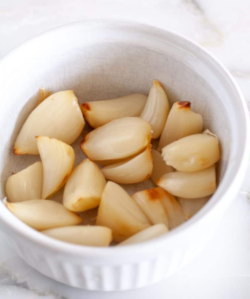 Cloves of garlic in a bowl. 