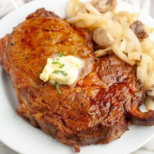 Cooked steak on a plate.