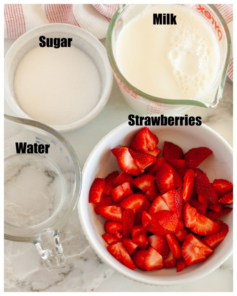 Bowl of strawberries, sugar, water and milk. 