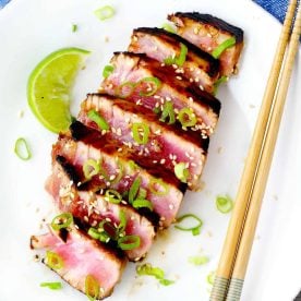 Sliced seared tuna on plate.