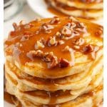 Pancakes stacked on a plate.