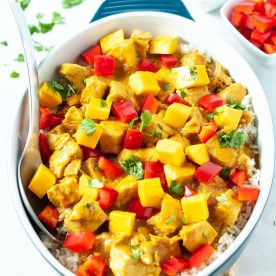 Bowl of chicken and mango.