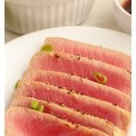 Ahi tuna on a plate.