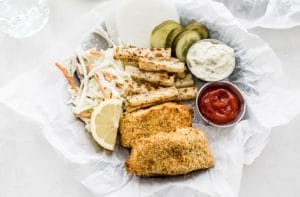 Breaded fish with pickles.