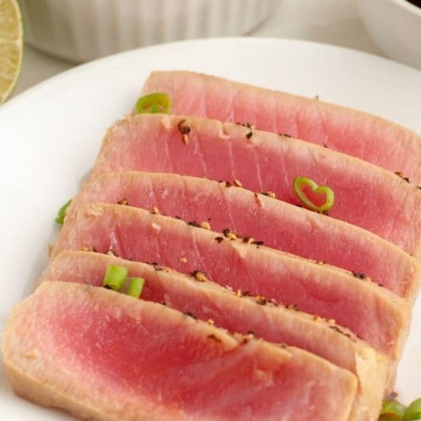 Tuna sliced with green onions.