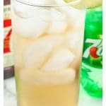 Tall glass filled with a drink.