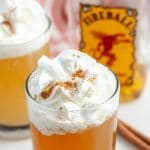Glass with juice and whipped cream.