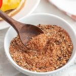 Bowl of spices with a spoon.