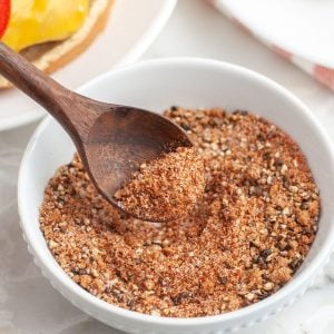Bowl of spices with a spoon.