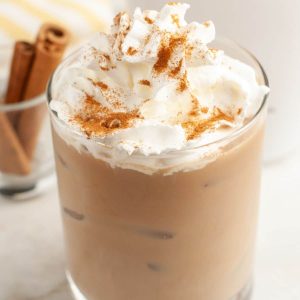 Glass with coffee and whipped cream.