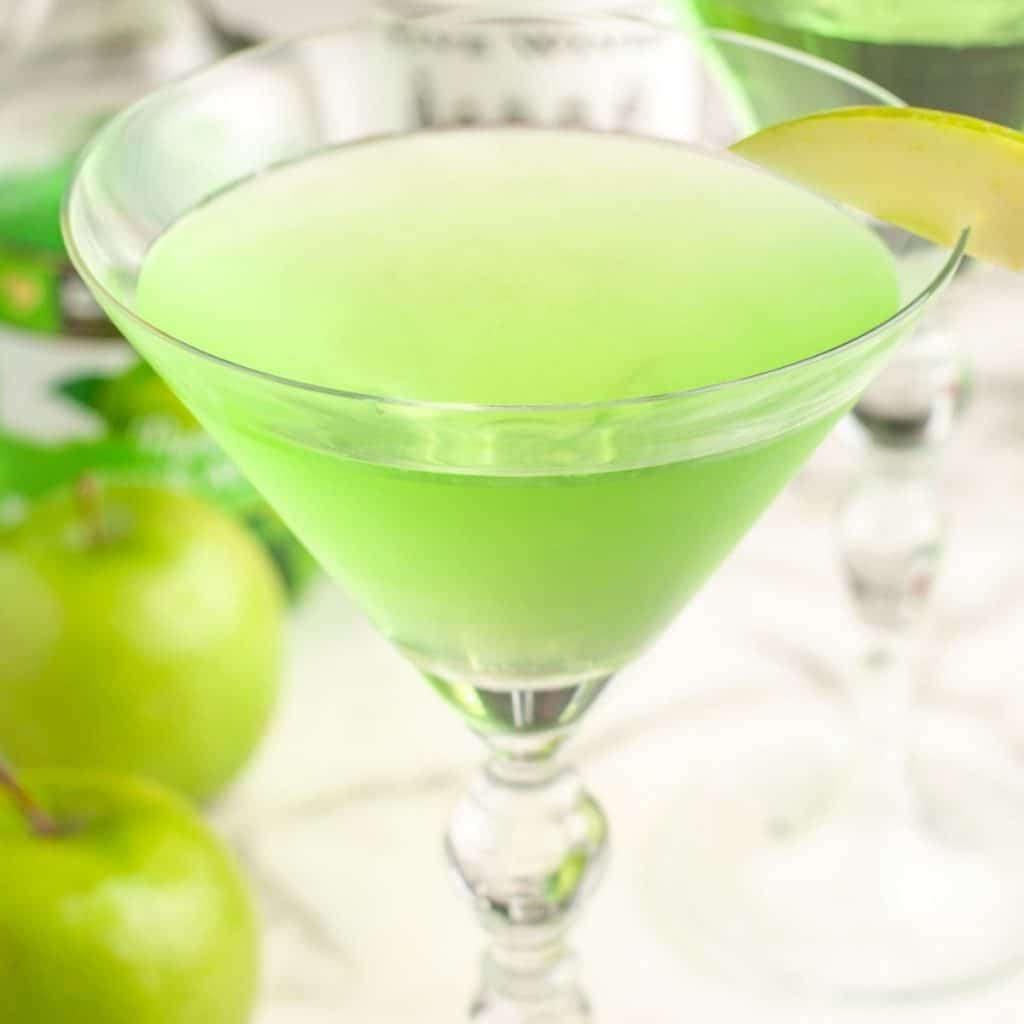 Martini glass with green drink.