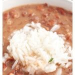 Rice and cooked beans in a bowl.
