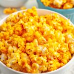 Bowl of cheese popcorn.