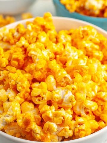 Bowl of cheese popcorn.