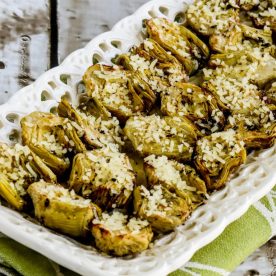 Roasted artichoke hearts on a serving dish.